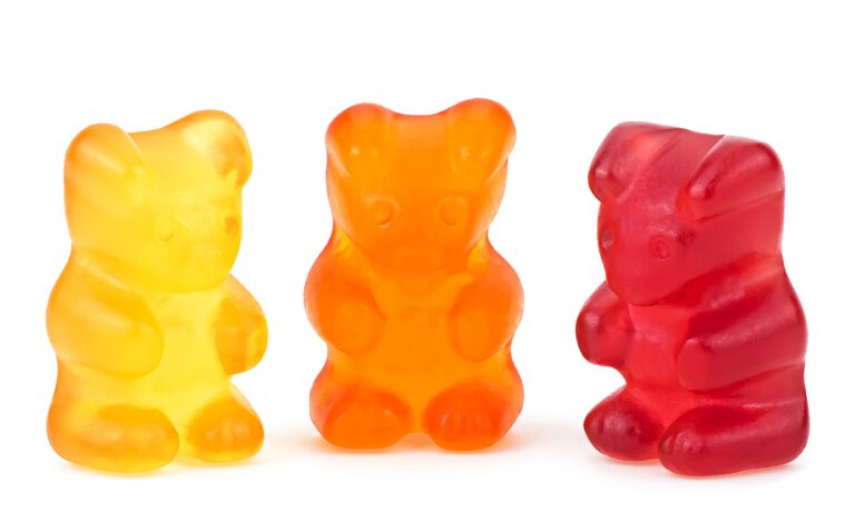A variety of colorful gummy candies in different shapes and translucent colors, made with BioconColors natural colorants such as Anthocyanins, Carmine, and Turmeric.